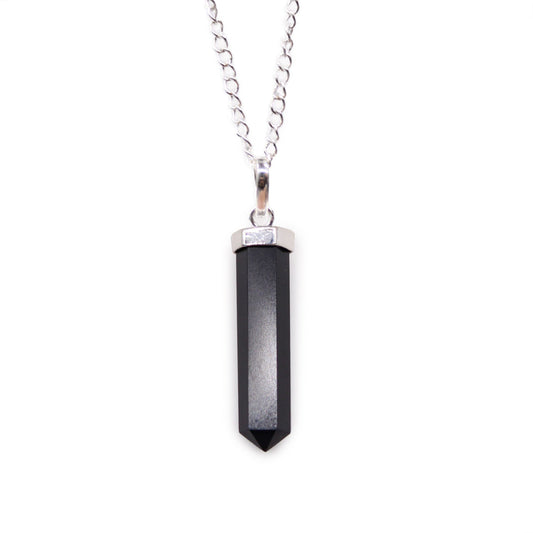 Black Agate is often associated with grounding, strength and protection, making this pendant a meaningful choice for everyday wear or a thoughtful gift for someone drawn to darker crystals.

Finished with a silver-plated chain, it pairs easily with casual outfits, layered jewellery and alternative styling. Natural variations in the stone mean each pendant may have slight differences in tone and finish.