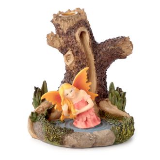Step into the realm of enchantment with the Ancient Tree Fairy Lake Backflow Incense Burner. Crafted with intricate detail, this mystical piece depicts a sacred tree overlooking a fairy’s hidden lake, where cascading smoke flows like mist across still waters.

In folklore, ancient trees are guardians of wisdom and gateways between worlds, while fairies are seen as keepers of magic and transformation. Together, they symbolize protection, balance, and renewal. When paired with backflow incense cones, the smok