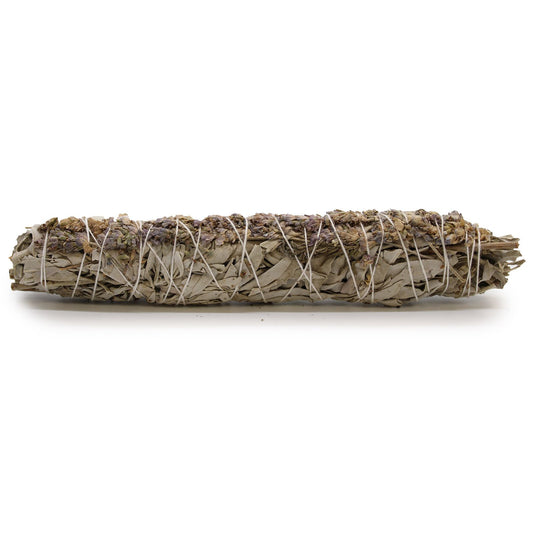 From The Witches’ Garden comes a soothing blend of harmony and purification — the White Sage & Lavender Smudge Stick. Handcrafted and measuring approximately 22.5cm, this beautifully bound bundle combines the powerful cleansing energy of white sage with the calming, healing essence of lavender.

Together, these sacred herbs create a serene smoke that clears negativity while promoting peace, relaxation, and emotional balance. Ideal for ritual cleansing, meditation, or creating a tranquil atmosphere in your s