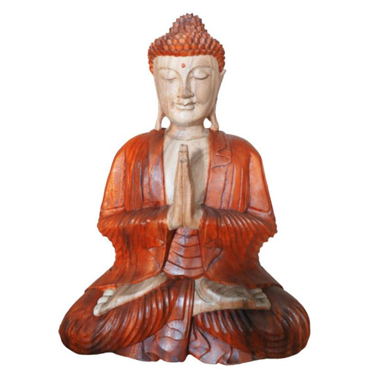 The gesture of welcome is the open hand of compassion, inviting peace and connection.

This 30cm Buddha statue is carved by hand from suar wood, shaped with care and devotion using traditional tools. Each detail, from the serene expression to the gentle folds of the robe, is patiently revealed by the artisan’s blade, a process that can take weeks to complete.

The Buddha is shown in the Varada Mudra, the Gesture of Welcome and Compassion. With the palm open and facing outward, the hand extends downward in a