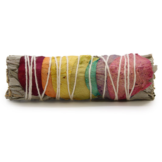 This radiant 7 Chakras Rose Petals Smudge Stick (10cm) is a sacred tool for balancing your energy centres, clearing blockages, and raising your vibration. Made from pure White Sage, it is adorned with rose petals dyed in the 7 chakra colours—each petal representing an energetic gateway within the body.

In my healing practice, I use this smudge stick during chakra alignment ceremonies, energy healing, and before meditation. White Sage purifies the aura and space, while the rose petals infuse the ritual with