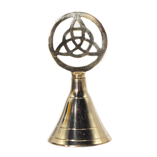 Channel the power of sacred geometry with this Altar Brass Bell – Triquetra, a symbol of eternity, protection, and spiritual unity. Handcrafted from solid brass and crowned with the ancient threefold knot, this bell resonates with timeless Celtic tradition and mystical energy.

Standing 10.5cm tall, it carries a balanced weight and produces a clear, resonant tone, making it an essential tool for rituals, meditation, and energy work. Crafted in India by skilled artisans, the polished brass finish adds elegan