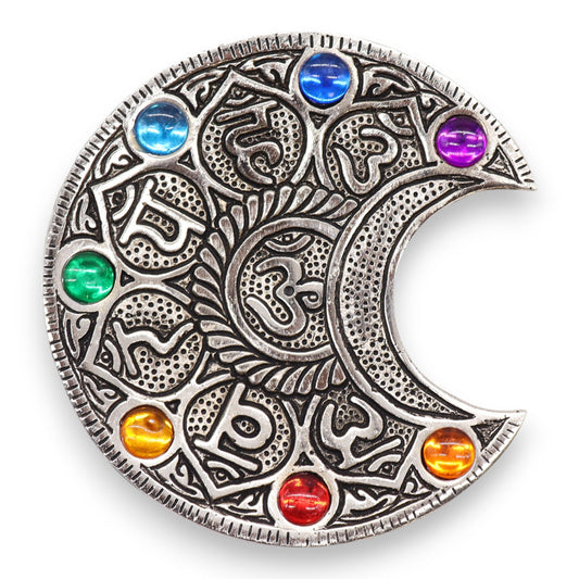 Measuring 11.5 cm, this enchanting incense holder is crafted to fit standard incense sticks, making it a must-have for your sacred meditation or relaxation altar. Its mesmerizing moon motif is illuminated by the vivid hues of the seven chakras, blending function with mystical beauty. Each chakra’s vibrant color embodies spiritual energy and balance, inviting harmony and deeper mindfulness into your ritual space. Perfect for those who walk the path of inner awakening and spiritual connection.