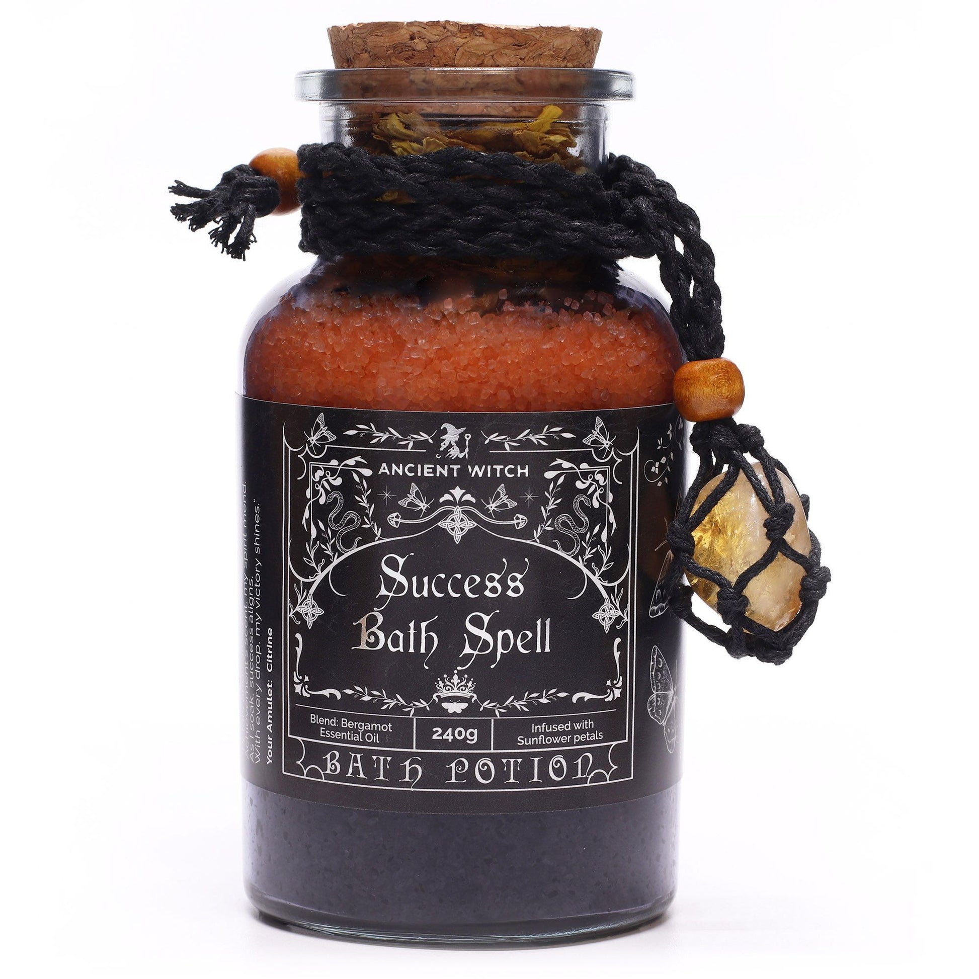 Awaken confidence and call in abundance with the Ancient Witch Success Bath Spell Potion & Citrine Crystal Amulet, a handcrafted ritual blend designed to uplift the spirit and empower your intentions.

Each 240g potion is crafted from Epsom salts, bergamot essential oil, and golden sunflower petals—a radiant combination that restores motivation and aligns the aura with prosperity and strength. The bright, citrus-infused fragrance of bergamot stirs inner fire, while sunflower petals echo the warmth and light