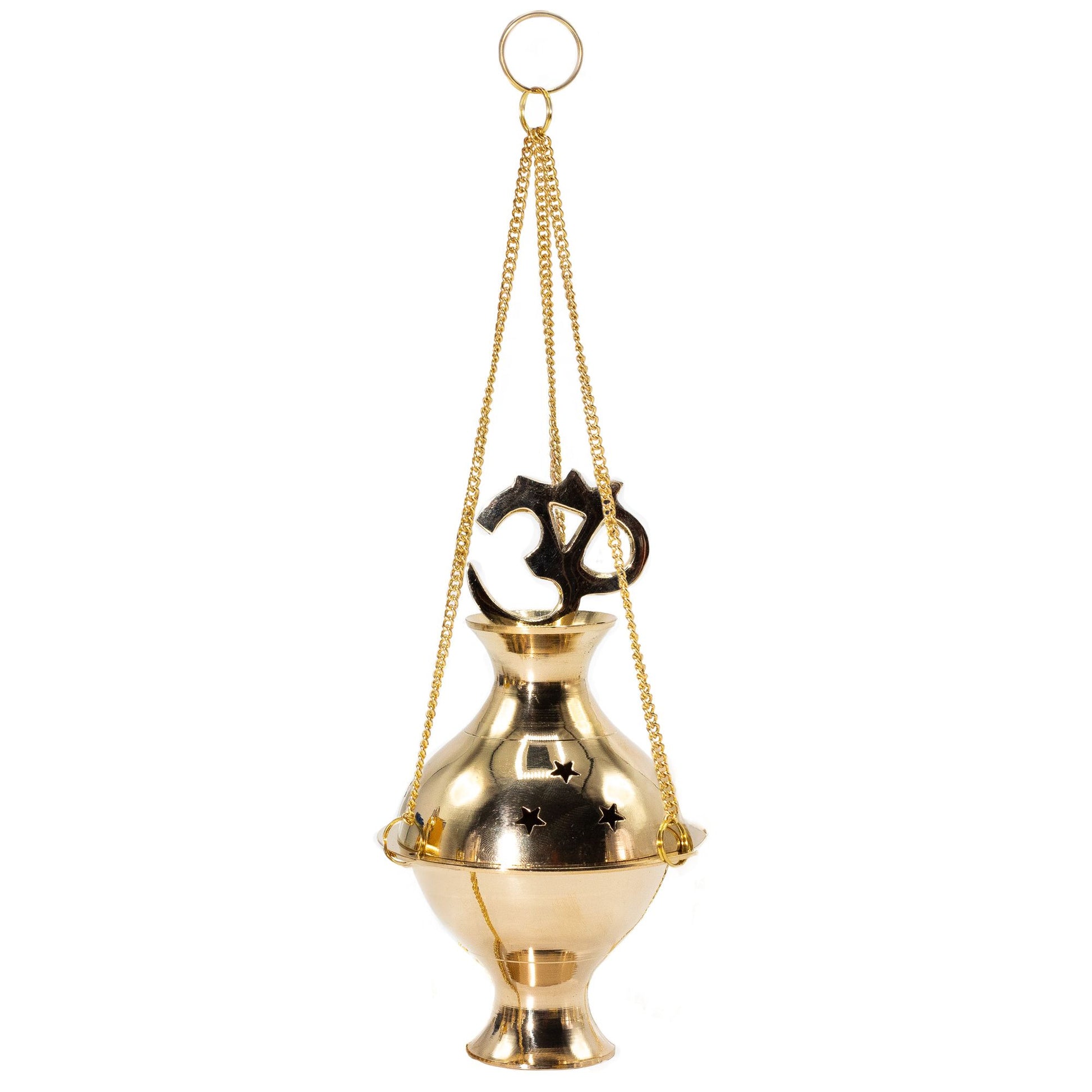 Bring harmony to your sacred space with this handcrafted Hanging Brass Incense Burner, adorned with the sacred Om symbol — a timeless mantra of peace, unity, and spiritual connection. Handmade in India from polished brass, it blends traditional craftsmanship with profound meaning.

Star-shaped cutouts allow the fragrant smoke to drift gently, creating a serene atmosphere perfect for meditation, rituals, yoga practice, or simple relaxation. The burner hangs gracefully from three golden chains with a central 