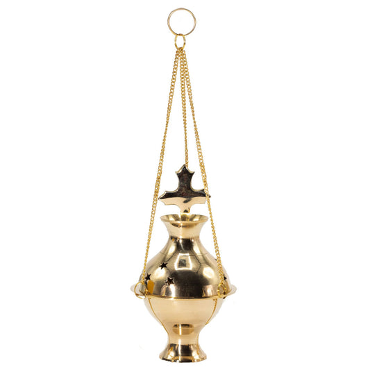 Handmade in India from polished brass, this sacred Hanging Brass Incense Burner is crowned with a traditional Cross finial, symbolising faith and devotion. Crafted with care, it blends timeless design with spiritual purpose, making it a meaningful addition to any prayer or meditation practice.

The burner is suspended by three golden chains with a central loop, allowing it to hang gracefully above altars, devotional spaces, or sacred corners of the home. Star-shaped cut-outs release aromatic smoke in gentle