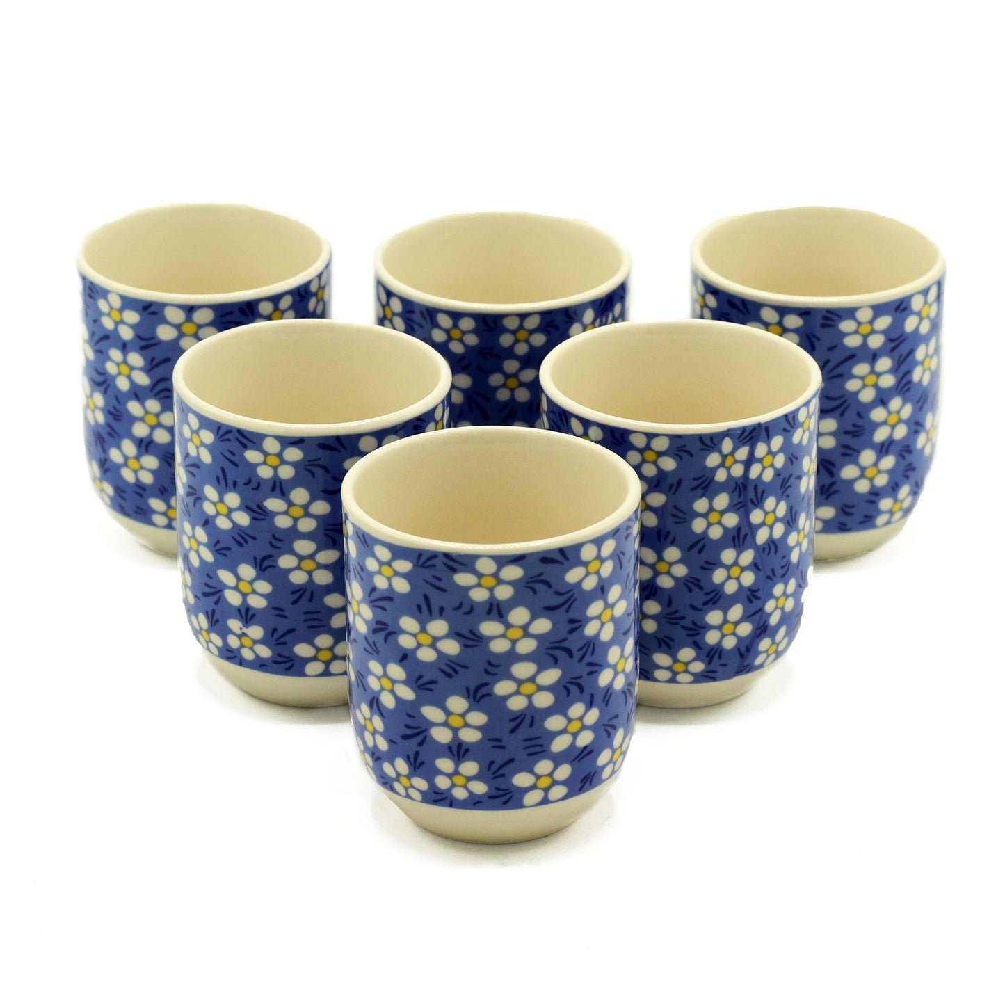 From The Witches’ Garden comes a delightful set of Herbal Tea Cups – Blue Daisy, crafted to enhance your personal tea rituals. These small, handleless cups allow you to feel the warmth of your tea directly in your hands, deepening your connection to the aromas, flavors, and the sacred moment of sipping.

Adorned with a whimsical blue daisy pattern, each cup adds a touch of enchantment to your herbal infusions, meditation, or magical gatherings. Ideal for intimate tea ceremonies or as a thoughtful gift for f