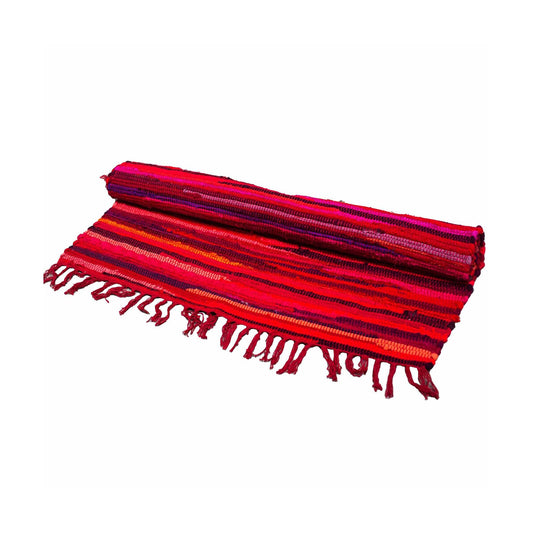 Wanderers of the wild, seekers of soul – welcome to our woven world.
These handmade rag rugs are more than mere floor coverings – they are spellbound story-weavers, conjured from the heart of India. Crafted by skilled hands under fairtrade skies, each rug is a patchwork of purpose, stitched with strands of intention and reclaimed fabric.

No two rugs are the same – and that’s the magic. Woven from recycled cloth, their colours whisper tales of distant lands, caravan journeys, and cottage dreams. Strong enou