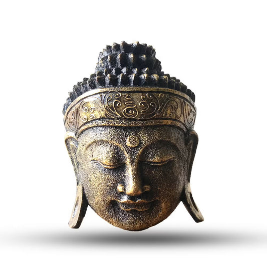 The radiant Buddha head shines with wisdom and serenity, a reminder that inner peace is the greatest wealth.

This 25cm Buddha Head Statue is handcrafted from sustainable albasia wood by skilled artisans in Indonesia and finished with a gold shine effect that enhances its timeless beauty. The soft golden tones reflect light gracefully, while the Buddha’s calm expression radiates tranquility, making it an elegant and auspicious piece for any home or meditation space.

The Buddha head, in Buddhist tradition, 