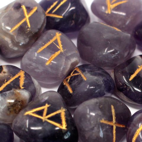 Unlock ancient wisdom with our Amethyst Rune Set, a powerful divination tool steeped in mysticism and history. This set includes 25 hand-carved Amethyst stones—24 engraved with traditional Elder Futhark runes and 1 blank (the "Odin" stone), all nestled in a soft drawstring pouch.

✨ Uses & Benefits of Amethyst:
Amethyst is a revered semi-precious stone known for its calming and spiritual properties. It enhances intuition, supports emotional healing, and provides psychic protection. Often used in meditation,