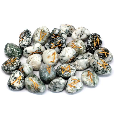 Shop Tree Agate Runes Set with 25 semi-precious stones in a pouch. Perfect for divination, meditation, and spiritual growth. Available now at The Witches Garden.