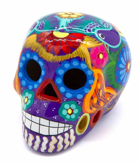 These fun ceramic sugar skull ornaments have been beautifully painted in bright colours and finished with a high shine glaze. They are a popular item during Día de Los Muertos or Day of the Dead festivities, held in Mexico every November to celebrate welcoming the souls of their deceased relatives back for a time of food, drink and celebration.