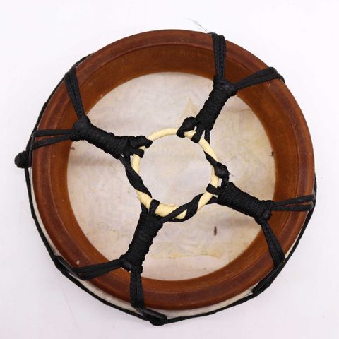 Immerse yourself in the sacred sounds of the 20cm Mandala Shamanic Drum, a compact yet powerful spiritual tool. Crafted with care from sustainable Suar wood and topped with authentic goat skin, this hand drum delivers deep, resonant tones perfect for shamanic journeying, meditation, or ritual work. The intricate Mandala design enhances the drum's energy, symbolising unity, balance, and inner harmony.

Whether you're a healer, sound therapist, or spiritual seeker, this drum is a beautiful addition to your sa