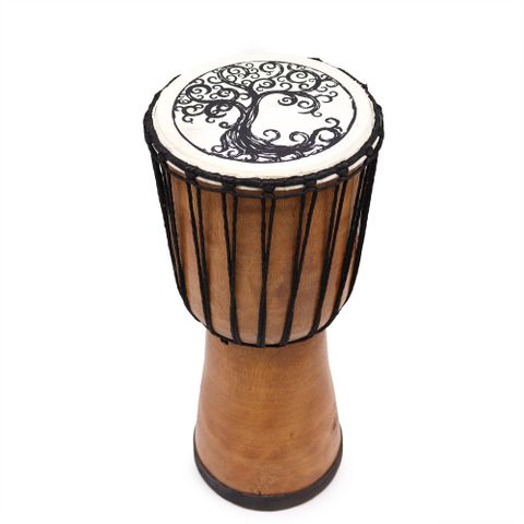 Immerse yourself in rhythm and symbolism with our 40cm Wide Top Djembe Drum featuring the Tree of Life design. Handcrafted in the West African tradition, this djembe boasts a distinctive flared top that offers a broader playing surface and deeper resonance.

The Tree of Life, beautifully illustrated on the drum skin, embodies spiritual connection, the cycle of life, and the harmony between all living things.

Both a powerful percussion instrument and a symbolic work of art, this drum is ideal for drumming c