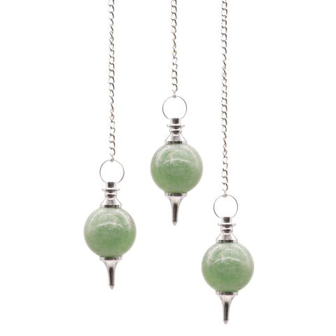 Whispering secrets from the earth, these Sphere Pendulums of Green Aventurine hold ancient power and guidance.
Crafted by the hands of artisans, each pendulum is unique, blessed by nature’s own rhythm. The soothing green hue of Aventurine calls forth healing, abundance, and the gentle courage to walk your spiritual path. Attached to a 170mm chain, ending with a gemstone bead, it is a sacred tool for divination, energy balancing, and connecting with your inner wisdom. Embrace the subtle dance of the pendulum