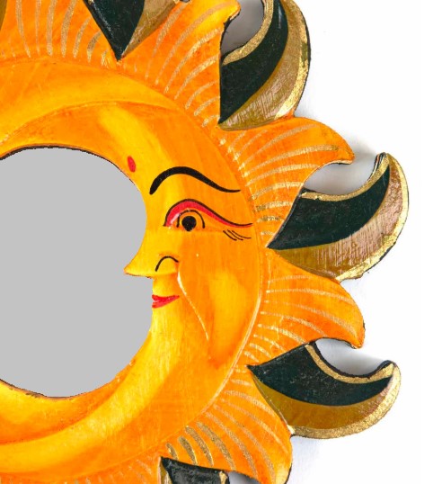 This exquisitely crafted, 20cm x 20cm hand-carved mirror displays two moons within sunrays and finished with sumptuous gold embellishments. A hoop on the reverse side promotes easy wall-hanging and the piece is certified Fairtrade, expertly handcrafted in Indonesia.