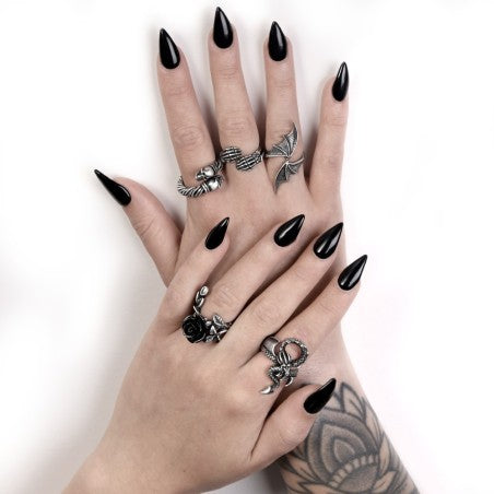 Like a whispering shoulder devil or a witches familiar, this tortuous personal miniature dragon coils itself around your finger.  This unique ring from Alchemy is an eye catching ring, paying homage to the mythical creature that is the dragon.