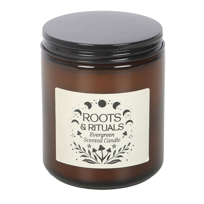 Bring the forest indoors with this evergreen scented candle, presented in an amber glass jar with a mystical Roots &amp; Rituals label. Perfect for grounding rituals or creating a fresh, nature-filled atmosphere. Approximately 22-hour burn time. Made from paraffin wax. Never leave a lit candle unattended.