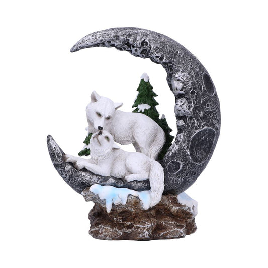 This beautiful figuring captures the serene beauty of nature with two majestic wolves perched upon a crescent moon, surrounded by a snowy landscape. There is a small light that illuminates the moon.
