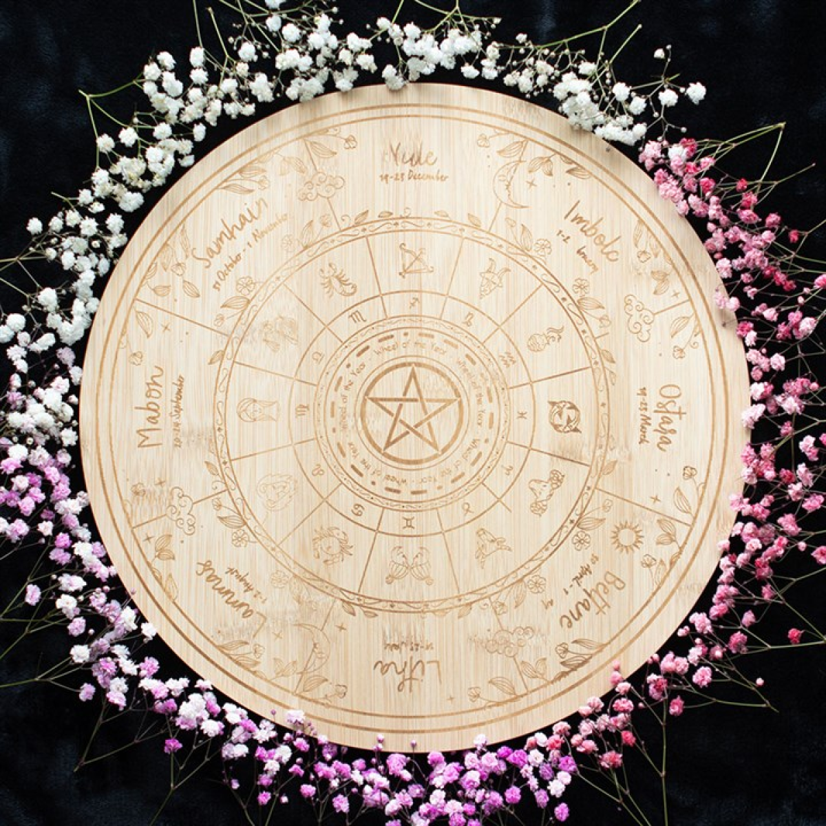 Celebrate the turning of the seasons with the Wheel of the Year Serving Board. Crafted from wood and engraved with the sacred symbols of all eight sabbats, this board brings a seasonal touch to gatherings, ritual feasts, or everyday meals. A practical yet spiritual accent, it carries the essence of the Pagan calendar into your kitchen or altar space. Use it to serve bread, fruits, cheeses, or offerings at sabbat celebrations, and let it become part of your ritual rhythm. Hand wash only. Do not soak.