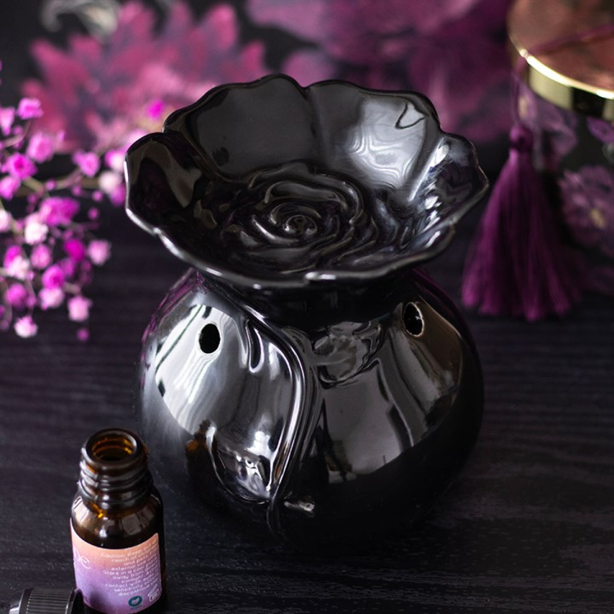 Black Rose ceramic oil burner. Perfect for fragrance oils, altars, meditation, or gothic home décor, bringing dark floral elegance to any space.