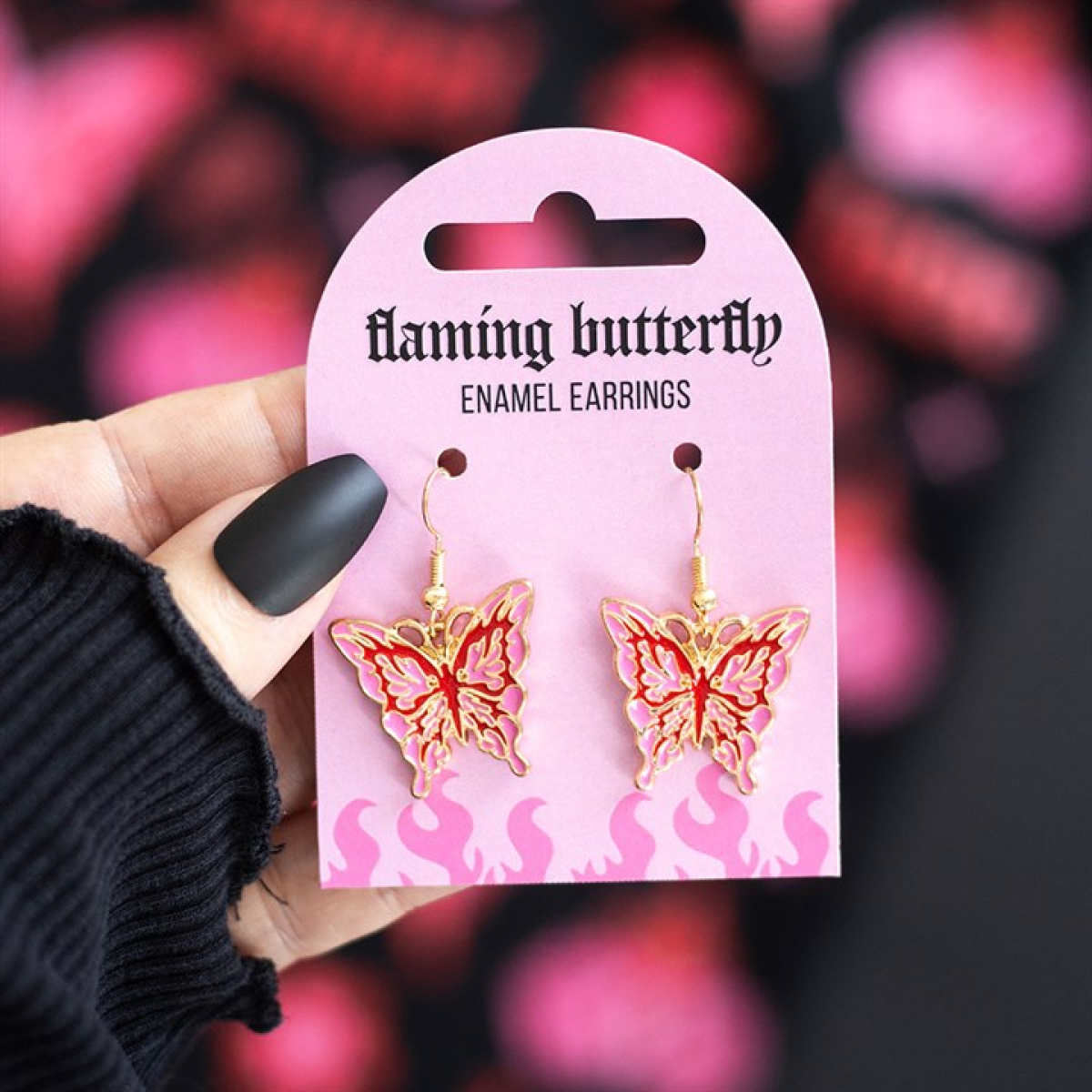 Pink and red flaming butterfly earrings with cybersigil Y2K style. Cute yet edgy gothic jewellery for alternative fashion lovers.