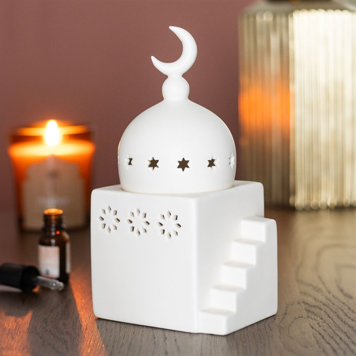 Mosque shaped ceramic multi-purpose burner. Use with fragrance oils, incense cones, bakhoor, or tealights for calming, mystical home décor.