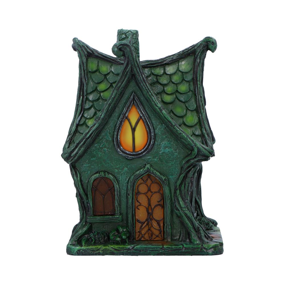 Deep within the shadowed glen lies the Evergreen Lodge — a fairy house aglow with ancient magic. Standing 17cm tall, this gothic-style cottage casts a gentle, mysterious light from within, thanks to its built-in LED illumination that awakens at twilight.

Crafted with care and charm, it features medieval-style arched windows, gnarled tree roots, and delicate s sculpted vines that wind up its stone-like walls. Every crevice whispers of old stories — of hidden folk and moonlit gatherings — making it the perfe