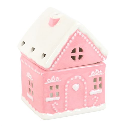 Invite enchantment into your sacred space with this whimsical Candy Pink Gingerbread House Oil Burner, lovingly detailed with frosted snow accents that radiate festive cheer. As a crystal healer, I see this piece not only as décor but as a heartwarming tool to raise the vibration of your home. Light a tealight within, and watch as soft golden light flickers through the windows—creating a nurturing glow that cleanses energy and invites joy.

Perfect for pairing with seasonal fragrance oils (always diluted wi