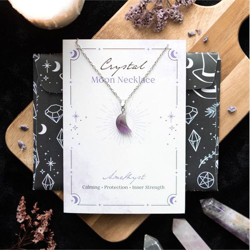 Send a little crystal magic someone's way with this greeting card featuring an amethyst crystal moon necklace for enhancing feelings of calm, protection and inner strength.