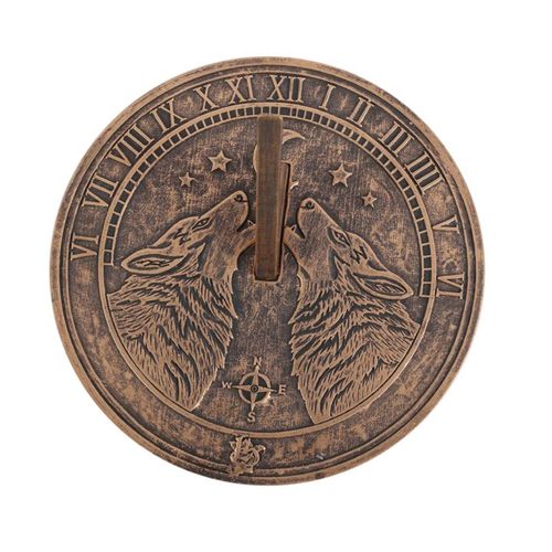 This terracotta sundial, crafted by Lisa Parker, showcases a striking Howling Wolf motif enhanced with a weathered bronze finish. Ideal for those who cherish the magic of nature and practical charm, it tells time under the sun while casting an enchanting spell over your garden. An authentic Lisa Parker creation, it weaves mystery and function into your outdoor sanctuary.