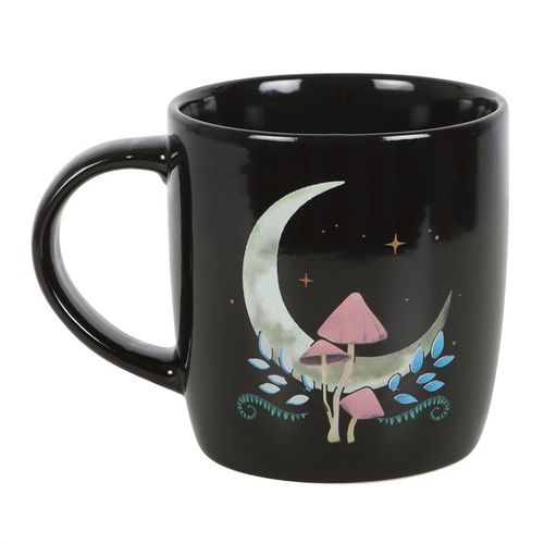Add a touch of enchantment to your morning cuppa with this dark forest moon ceramic mug. This black ceramic mug features a captivating and intricate forest moon design, including a toadstool, stars and flora and fauna. 340ml capacity, dishwasher and microwave safe.