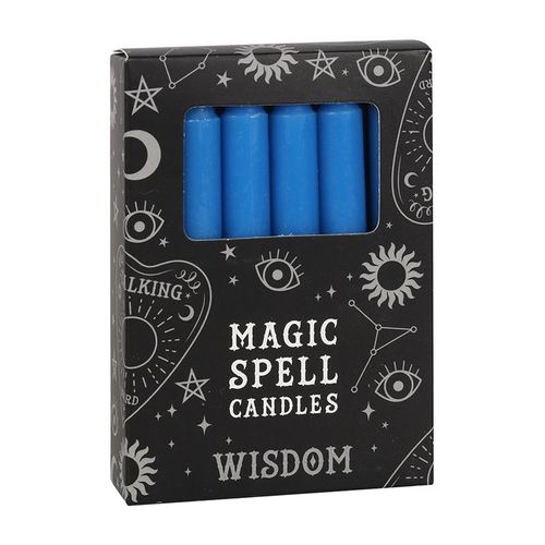 Box of blue magic spell candles with mystical designs on a white background