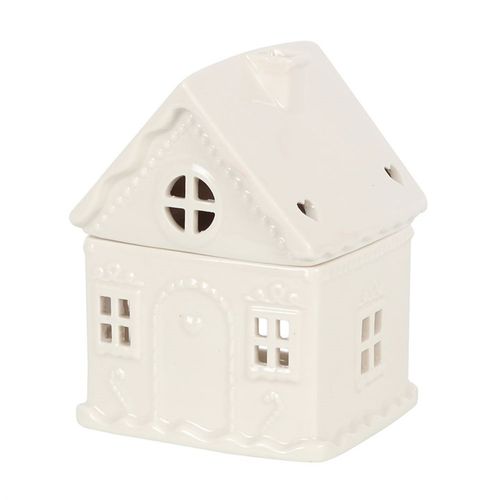Invite warmth and enchantment into your sacred space this Yule season with our White Gingerbread House Oil Burner. Crafted in the shape of a charming, snow-kissed cottage, this sweet ceramic burner channels the nostalgic spirit of winter, invoking cosy candlelit nights and aromatic blessings.

Let this burner be your seasonal altar companion—simply add your favourite festive fragrance oil diluted with water, and watch the gentle flicker of the tealight awaken joy, peace, and clarity in your home.

The lidde