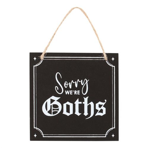 Present a subtle caution to unsuspecting visitors with this amusing hanging sign. It displays the phrase 'Sorry We're Goths' in elegant gothic script, delivering a delightfully dark greeting. Completed with a jute rope, it’s ready to hang and enchant your space.
