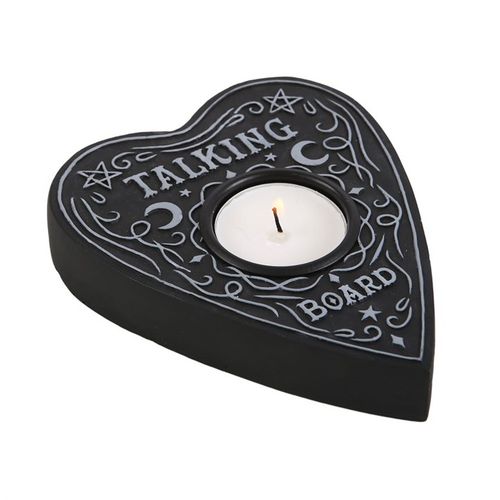 Transform any setting into a spooky sanctuary with this unique tealight holder inspired by the planchette from a talking board. Arrange multiple holders to create a dramatic centerpiece for a grand party display or scatter them strategically to infuse your night of horror movies with an extra layer of mystique.