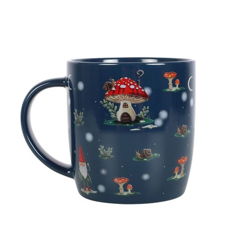 Start your day with a sprinkle of enchantment using this captivating mug adorned with a winter forest motif. Showcasing charming illustrations of mushroom cottages, gnomes, and snails, this deep navy-blue mug invites warmth and whimsy to your chilly mornings. With a 350ml capacity, it’s ideal for your favorite hot brews and is both dishwasher and microwave safe for effortless magic