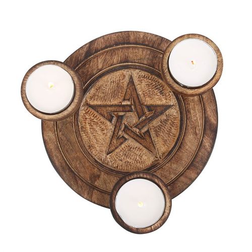 Lovely wooden tealight candle holder featuring a pentagram star design. Product Dimensions: H2.5cm x W17.2cm x D16cm Packaged Dimensions: H4cm x W17.5cm x D18cm