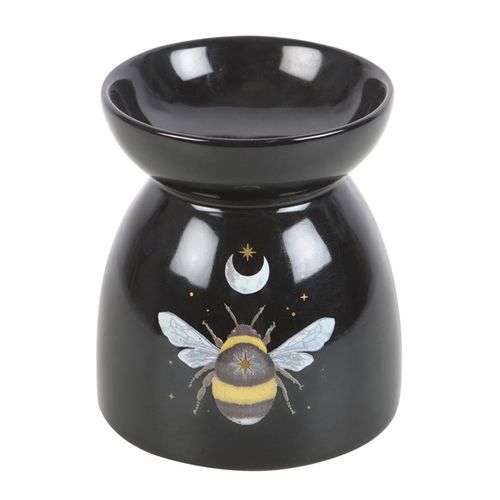 Welcome the magic of the forest into your sacred space with this Forest Bee Black Oil Burner, a mystical companion for aromatherapy and energetic alignment. Crafted with intention and adorned with celestial moon and star motifs, this enchanting piece radiates the grounded energy of the forest bee—an ancient symbol of unity, purpose, and divine timing.

Place your favorite essential oil or wax melt above a gentle tealight, and allow the soothing scents to raise your vibration and shift the energy of your hom