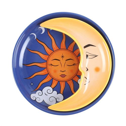 This round trinket dish features a glowing sun motif and pairs beautifully with a crescent moon-shaped dish that fits perfectly atop it. Ideal for keeping your tiny treasures in order, this stacked set brings a sprinkle of celestial enchantment to your surroundings. A magical and stackable keepsake, this cosmic pair makes a bewitching gift for those who find wonder beneath the night sky.