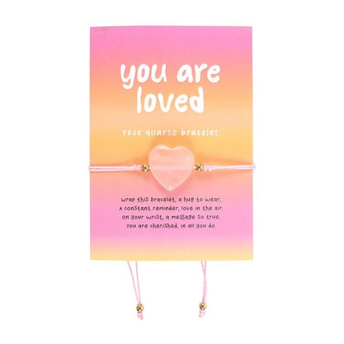 Radiate love and positivity with this charming rose quartz crystal heart bracelet. Presented on a heartfelt backing card that reads 'You are loved' and includes a short poem expressing how deeply cherished the wearer is. An ideal gift to remind someone special of their worth and the affection they inspire.
