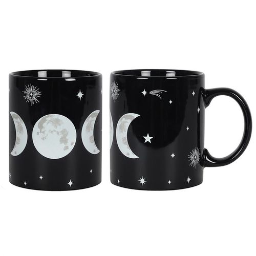 This ceramic mug showcases an enchanting Triple Moon motif encircled by shimmering stars. The Triple Moon represents the waxing, full, and waning phases of the moon, embodying the Maiden, the Mother, and the Crone aspects of the Triple Goddess., also known as the Divine feminine). 350ml capacity. Dishwasher and microwave safe.