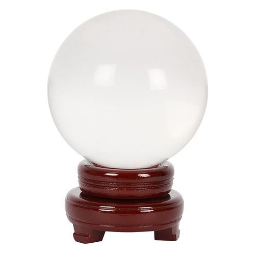 A crystal ball is traditionally used for fortune telling and divination, particularly a practice called scrying, where individuals focus on a reflective surface like a crystal ball to see visions of the future. Some believe crystal balls can facilitate a connection to the divine or reveal hidden information, though their use is often viewed as a tool for intuition and inspiration rather than a literal predictor of the future.