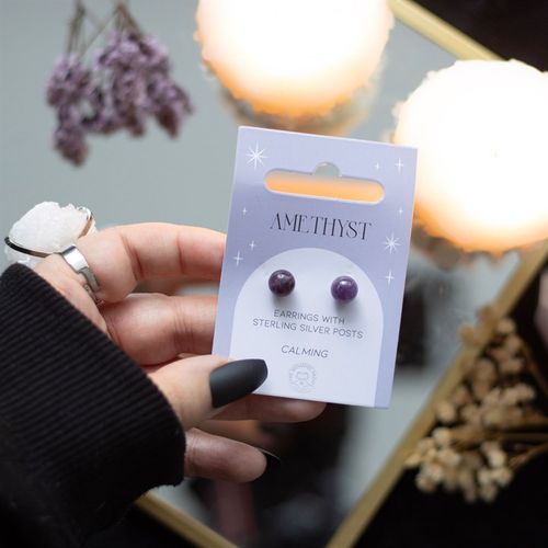 This pair of amethyst crystal stud earrings comes on a matching backing card and makes a meaningful gift for those in need of spiritual protection. Amethyst is a powerful semi-precious stone believed to balance emotions, making it ideal for relaxation and courage.