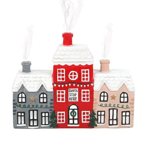 Infuse your space with the warm magic of the season using our enchanting Christmas Village incense cone holder. Crafted as a trio of tiny houses, this mystical piece not only fills your home with captivating scents but also serves as a bewitching festive decoration. Perfect for conjuring cozy holiday vibes. Dimensions: H11.4cm x W14.7cm x D4.6cm. Packaged: H11.8cm x W16cm x D5cm.