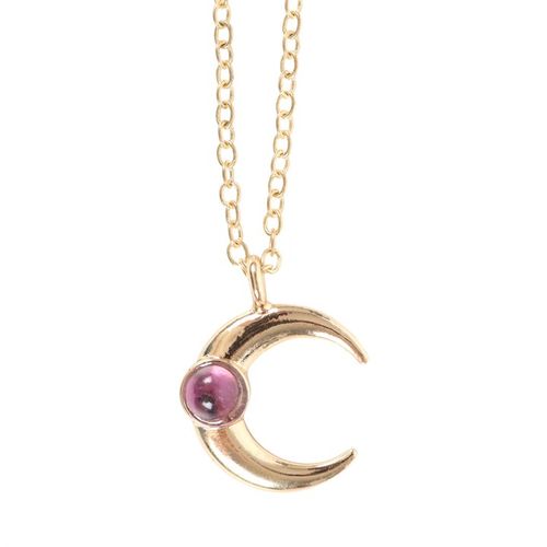 Gold crescent moon necklace with a pink gemstone on a white background