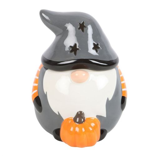 Halloween-themed gnome figurine with a witch hat and pumpkin on a white background