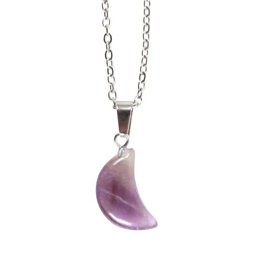 Purple crescent moon pendant on a silver chain against a white background