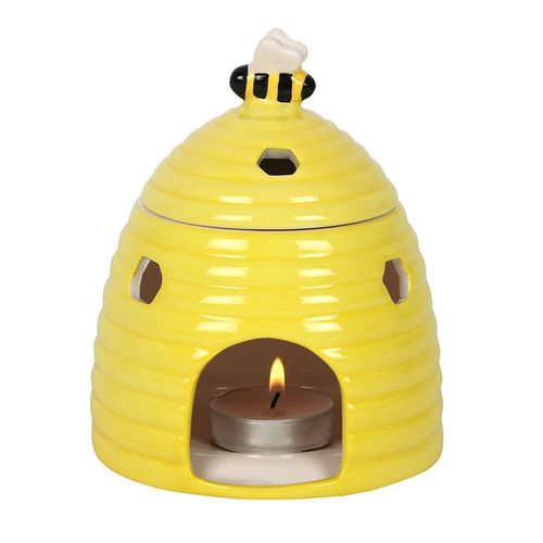 Infuse your sacred space with the radiant energy of the sun and the sweet hum of nature’s rhythm. Our Sunny Beehive Ceramic Oil Burner is more than just a beautiful décor piece—it’s a vessel for healing, transformation, and intention-setting.

Crafted with care from ceramic, this enchanting oil burner resembles a sun-kissed yellow beehive, crowned with a delicate bee that symbolizes community, diligence, and the sacred sweetness of life. The honeycomb-shaped cut-outs are not only magical in design but also 