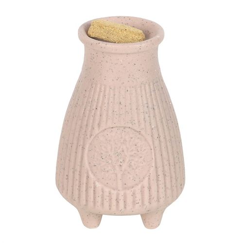This greige ribbed ceramic Palo Santo Brick burner is perfect for safely holding and burning Palo Santo incense bricks. Its ribbed texture adds a contemporary yet timeless touch to any space. Cleansing and purifying negative energies, this burner can be used to enhance spiritual rituals or used as a decorative accent.